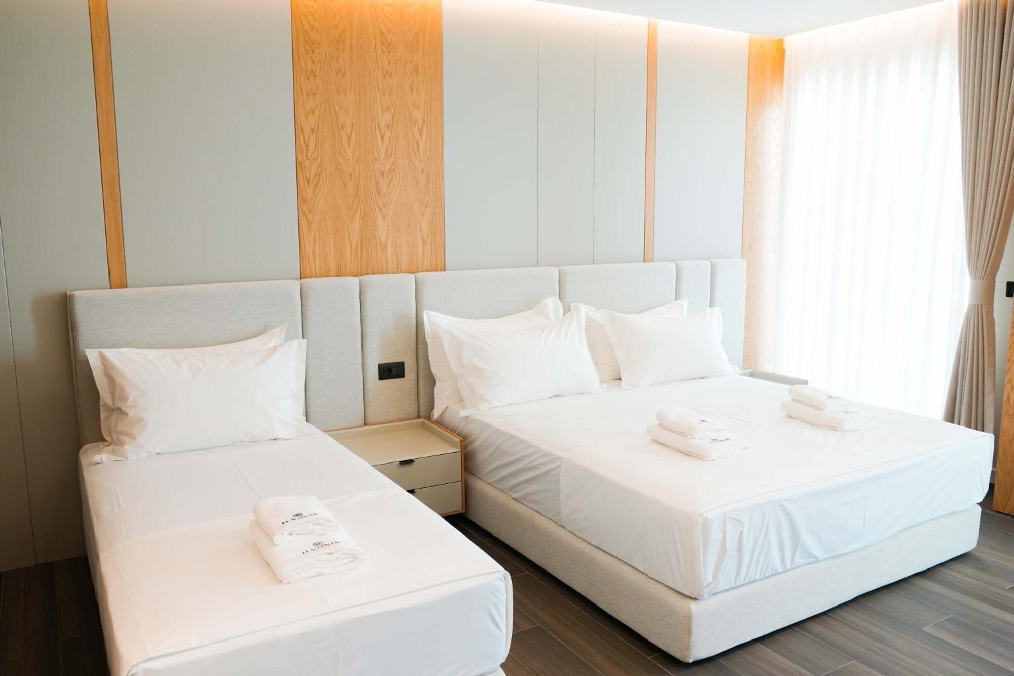 Dreibettzimmer mit Meerblick